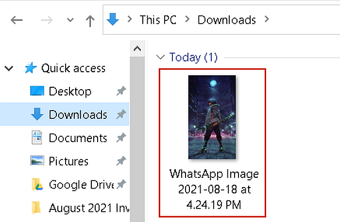 Gedeelte van een schermafbeelding van Windows Verkenner met een gedownloade WhatsApp-afbeelding